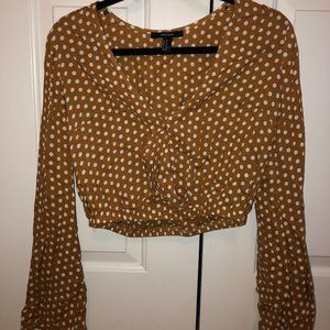 Burnt orange and white polka dot cropped blouse